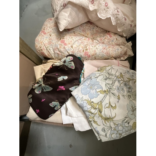 103 - 9 BOXES OF LINEN TO INCLUDE CURTAINS, QUILTS, TOWELS ETC