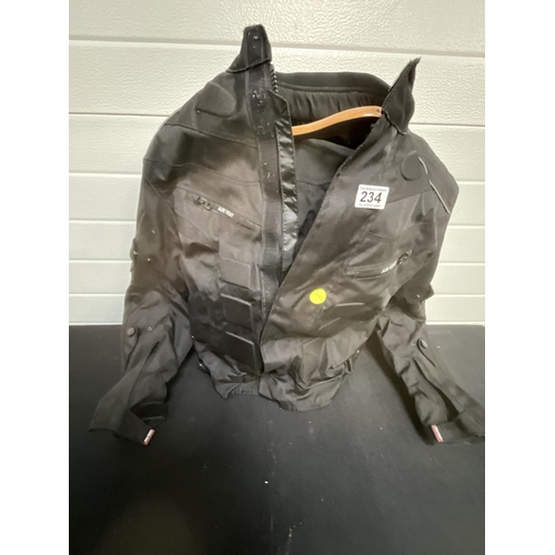 234 - 2 MOTORBIKE JACKETS AND LEGGINGS