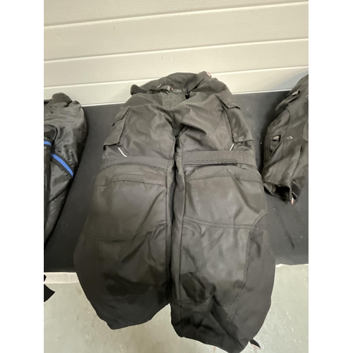 234 - 2 MOTORBIKE JACKETS AND LEGGINGS