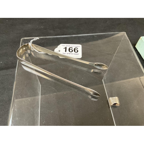 166 - HALLMARK SILVER SUGAR TONGS, PLATED PICKLE FORK, HALLMARK CIGARETTE CASE A.F 3 NAPKING RINGS - TOTAL... 