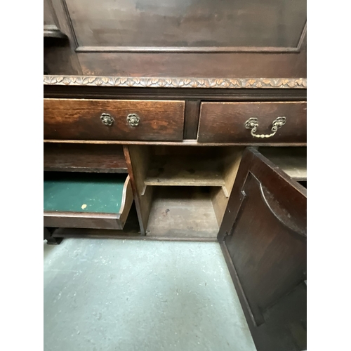 254 - LARGE HEAVY OAK SIDEBOARD WITH REEDED COLUMN SUPPORTS TO BACK 2 DRAWERS OVER 3 DOORS H75