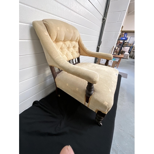 257 - GOLD UPHOLSTERED BEDROOM ARMCHAIR ON ORIGINAL BRASS CASTORS