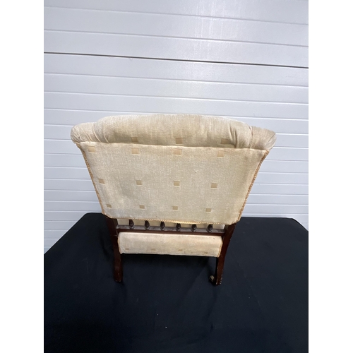 257 - GOLD UPHOLSTERED BEDROOM ARMCHAIR ON ORIGINAL BRASS CASTORS