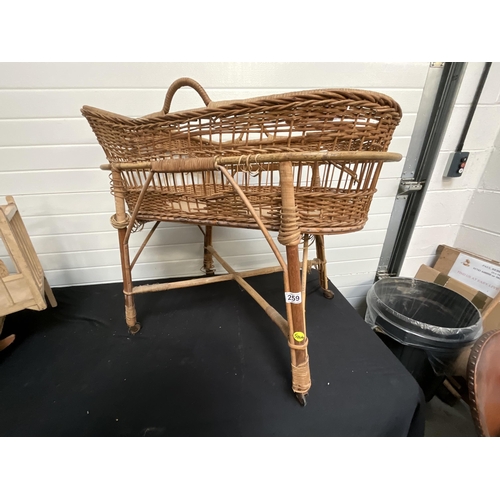 259 - VINTAGE WICKER CRIB ON STAND, SMALLER WICKER CRIB AND DOLLS COT A/F LEG MISSING