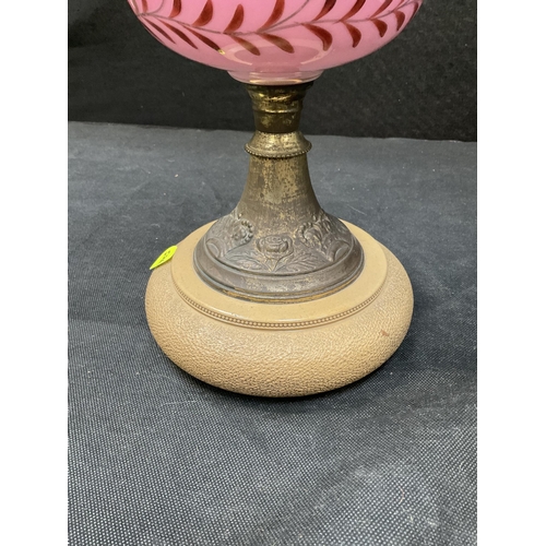 178 - VICTORIAN BRASS AND GLASS OIL LAMP WITH A CERAMIC & BRASS BASE PINK GLASS RESERVOIR COMPLETE WITH CH... 