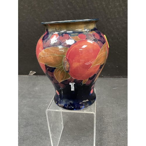 196 - MOORCROFT BULBUS POMEGRANATE VASE SIGNED TO BASED - CHIPS TO INSIDE