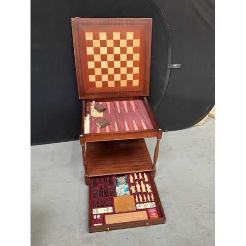 292 - REPRODUCTION MAHOGANY GAMES  TABLE WITH ACCESSORIES H22