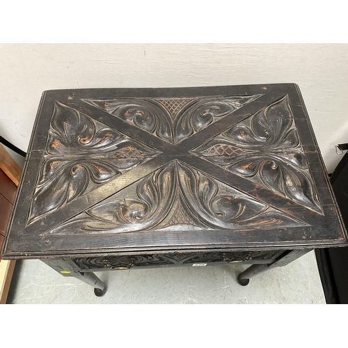 339 - EARLY HEAVILY CARVED DARK OAK HALL TABLE WITH SINGLE DRAWER OF PEGGED AND DOWELLED CONSTRUCTION H28