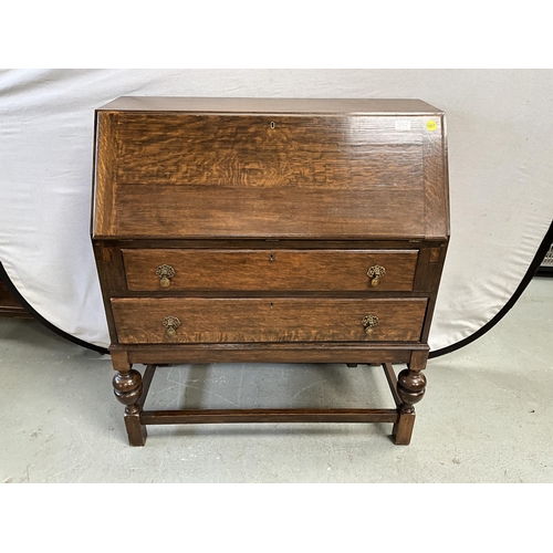 352 - VINTAGE OAK BUREAU WITH FITTED INTERIOR AND 2 DRAWERS OVER STRETCHERED BASE H39