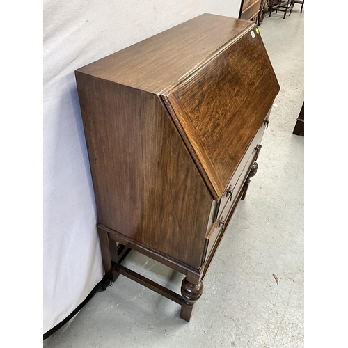 352 - VINTAGE OAK BUREAU WITH FITTED INTERIOR AND 2 DRAWERS OVER STRETCHERED BASE H39