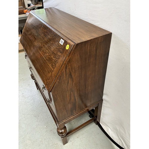 352 - VINTAGE OAK BUREAU WITH FITTED INTERIOR AND 2 DRAWERS OVER STRETCHERED BASE H39