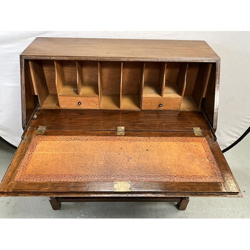 352 - VINTAGE OAK BUREAU WITH FITTED INTERIOR AND 2 DRAWERS OVER STRETCHERED BASE H39