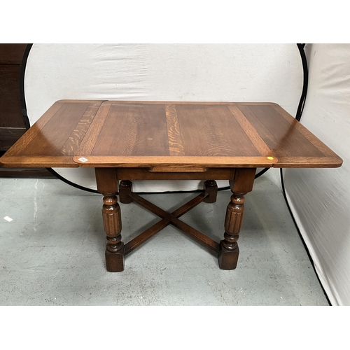 380 - VINTAGE OAK DRAWER LEAF DINING TABLE ON 4 REEDED LEGS WITH STRETCHERED BASE H30