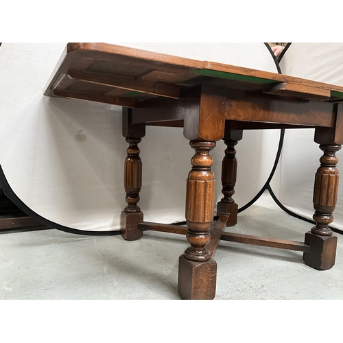 380 - VINTAGE OAK DRAWER LEAF DINING TABLE ON 4 REEDED LEGS WITH STRETCHERED BASE H30