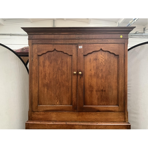 389 - GEORGIAN OAK PRESS CUPBOARD WITH 2 PANELLED DOORS TO TOP AND 2 PANELLED DOORS TO BASE H92