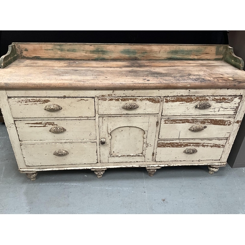 395 - VICTORIAN PINE KITCHEN BASE WITH 7 DRAWERS AND CENTRAL DOOR TO BASE - A/F H39