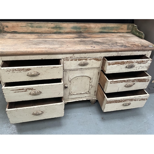 395 - VICTORIAN PINE KITCHEN BASE WITH 7 DRAWERS AND CENTRAL DOOR TO BASE - A/F H39