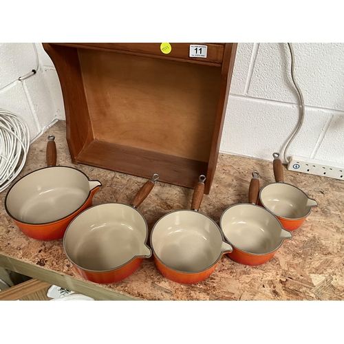 11 - FRENCH CAST IRON LE CREUSET PAN SET COMPLETE WITH LIDS, STAND AND FRYING PAN