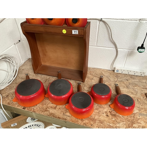 11 - FRENCH CAST IRON LE CREUSET PAN SET COMPLETE WITH LIDS, STAND AND FRYING PAN