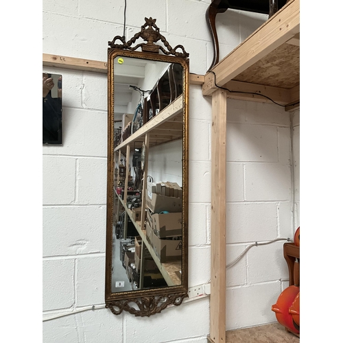 8 - EARLY GILT FRAMED WALL MIRROR WITH RAMS HEAD AND GRECIAN URN AND RIBBON GILT DECORATION 56 X 16