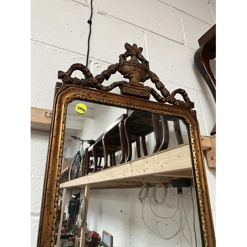 8 - EARLY GILT FRAMED WALL MIRROR WITH RAMS HEAD AND GRECIAN URN AND RIBBON GILT DECORATION 56 X 16