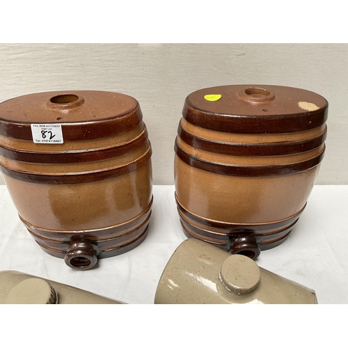 82 - 2 VICTORIAN EARTHENWARE GLAZED BARRELS AND 2 HOT WATER BOTTLES - BARRELS H 11