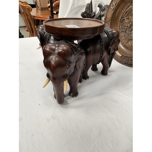 101 - CARVED MAHOGANY ELEPHANT PEDESTAL TABLE CENTRE PIECE, 2 CARVED ORIENTAL MASKS, CARVED PLATE