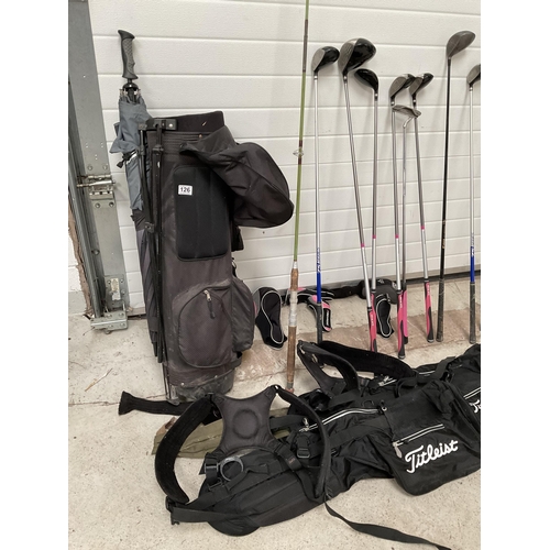 126 - LADIES CARBON FIBRE GOLF CLUBS AND BAG AND A SPARE BAG