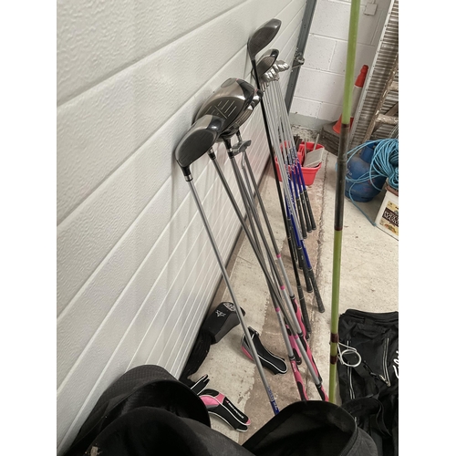 126 - LADIES CARBON FIBRE GOLF CLUBS AND BAG AND A SPARE BAG