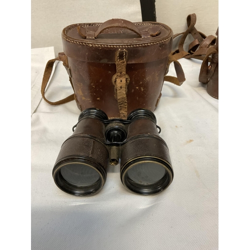 143A - 2 VINTAGE LEATHER CASED FIELD BINOCULARS