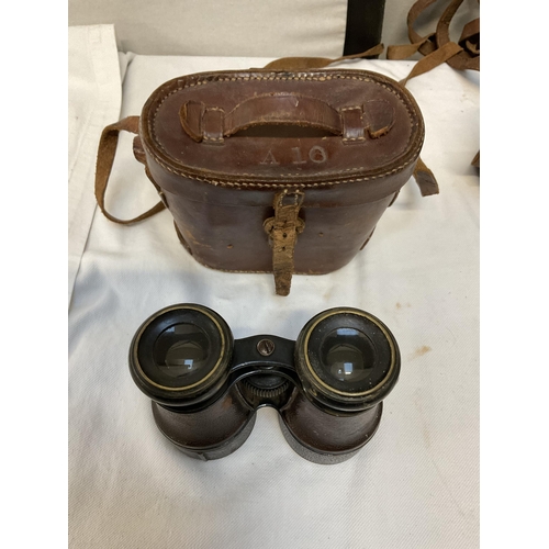 143A - 2 VINTAGE LEATHER CASED FIELD BINOCULARS