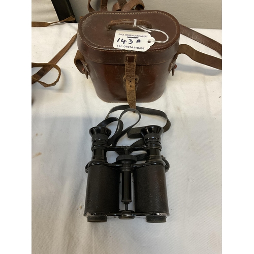 143A - 2 VINTAGE LEATHER CASED FIELD BINOCULARS