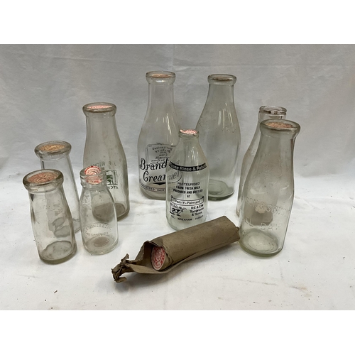 163 - VINTAGE CRATE OF VINTAGE MILK BOTTLES AND TOPS