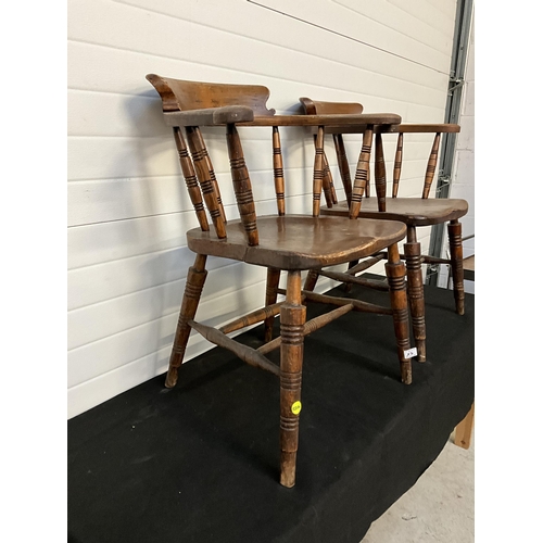 167 - PAIR OF OAK SMOKERS BOW ARMCHAIRS - STAMPED GLENISTER WYCOMBE