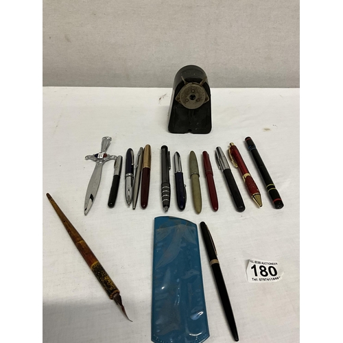 180 - QTY OF OLD PENS AND A PENCIL SHARPENER