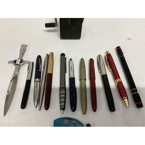 180 - QTY OF OLD PENS AND A PENCIL SHARPENER