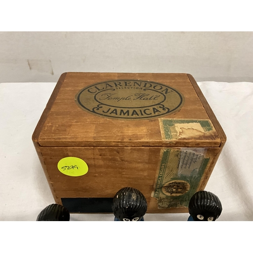 189 - BOX WITH ROBERTSONS GOLLY BAND, SMALL BADGE AND VINTAGE PLAYING CARDS IN A JAMAICA BOX