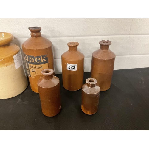 283 - 7 EARTHENWARE JARS AND BOTTLES