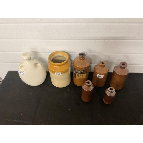 283 - 7 EARTHENWARE JARS AND BOTTLES