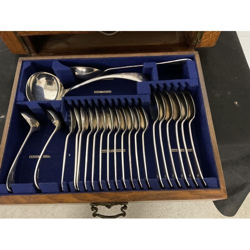 295 - COLINGWOOD & SON LTD OAK CANTEEN OF CUTLERY WITH FITTED DRAWERS APPROX 90 PIECES A/F H 9