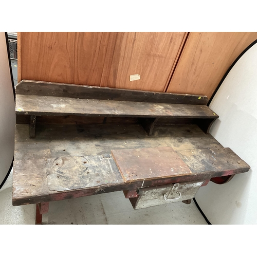 479 - LARGE WORK BENCH WITH HEAVY CAST IRON ENDS (ORIGINATES FROM GKN SANKEYS OF TELFORD)