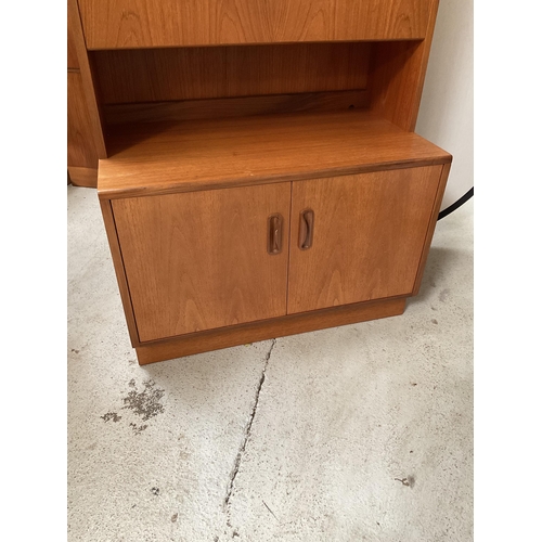 490 - VINTAGE TEAK LOUNGE CABINET WITH OPEN SHELVES OVER COCKTAIL CABINET AND 2 DOORS TO BASE BADGED G PLA... 