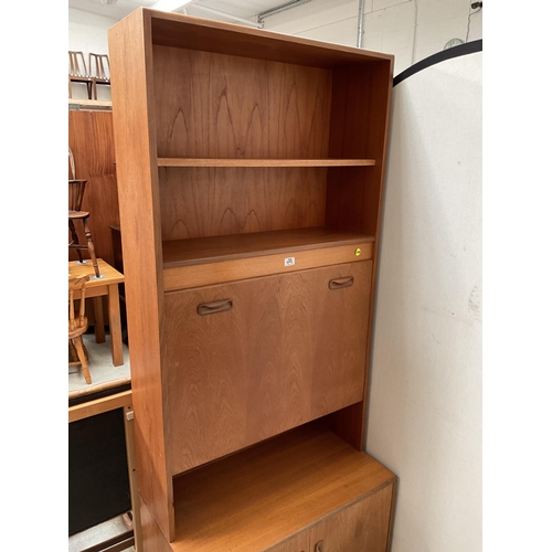 491 - VINTAGE TEAK LOUNGE CABINET WITH OPEN SHELVES OVER COCKTAIL CABINET AND 2 DOORS TO BASE BADGED G PLA... 