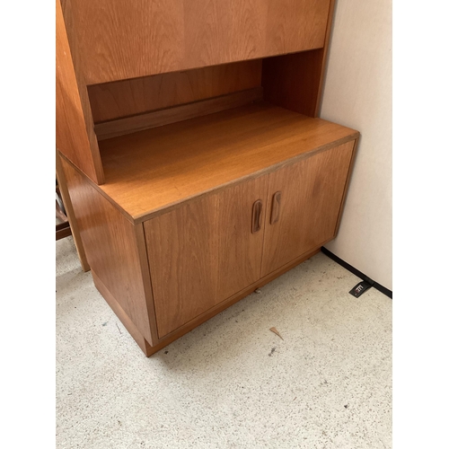 491 - VINTAGE TEAK LOUNGE CABINET WITH OPEN SHELVES OVER COCKTAIL CABINET AND 2 DOORS TO BASE BADGED G PLA... 