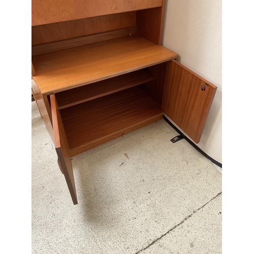 491 - VINTAGE TEAK LOUNGE CABINET WITH OPEN SHELVES OVER COCKTAIL CABINET AND 2 DOORS TO BASE BADGED G PLA... 