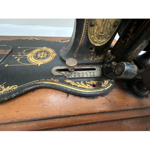 11 - VINTAGE SINGER CASED HAND SEWING MACHINE