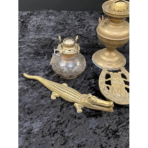 7 - 2 OIL LAMPS AND 2 PIECES OF BRASS TALLEST 9