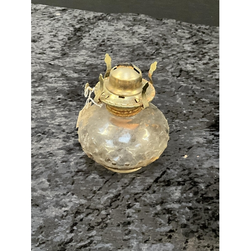 7 - 2 OIL LAMPS AND 2 PIECES OF BRASS TALLEST 9