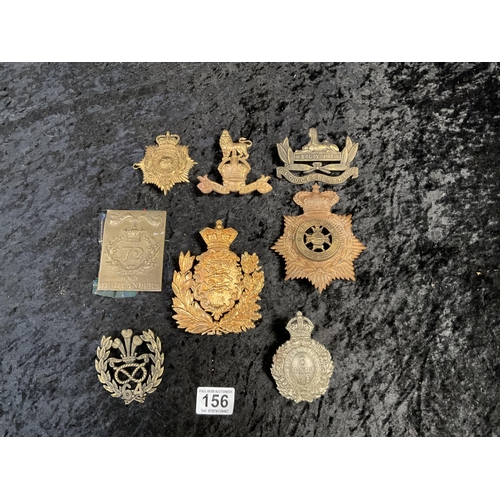 156 - QTY OF MILITARY HELMET BADGES ETC