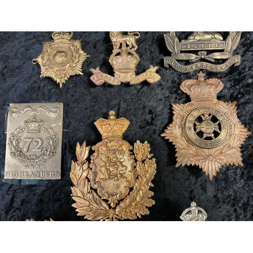 156 - QTY OF MILITARY HELMET BADGES ETC